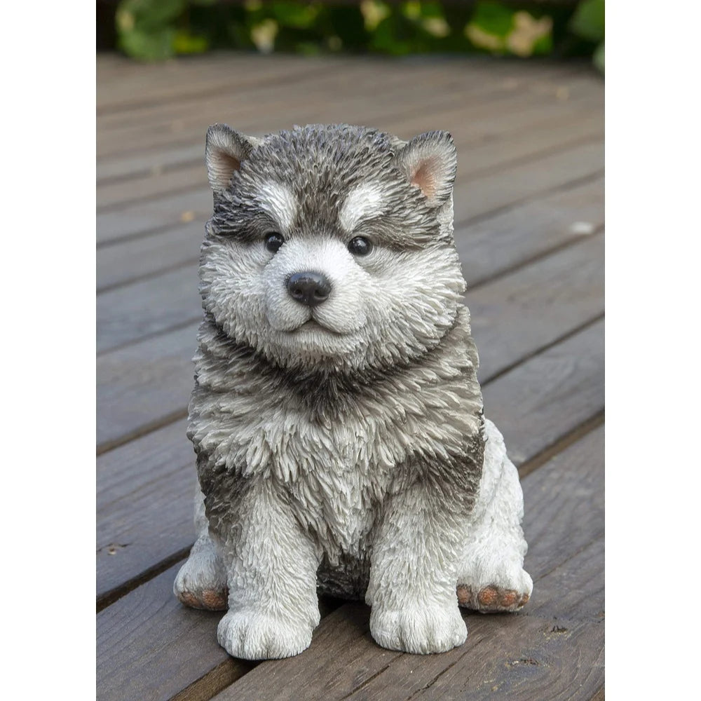 Realistic Sitting Malamute Puppy Statue
